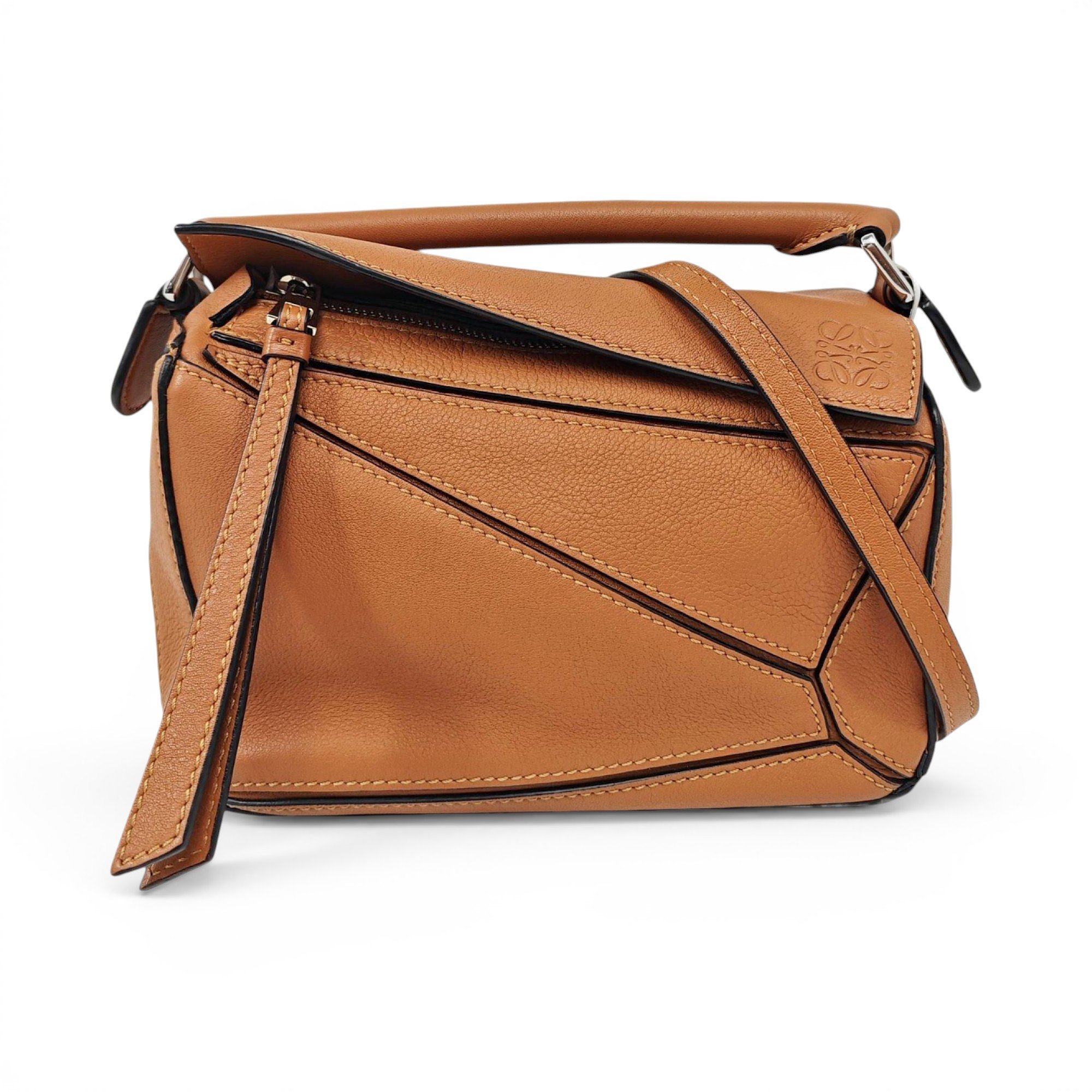 Puzzle leather handbag
