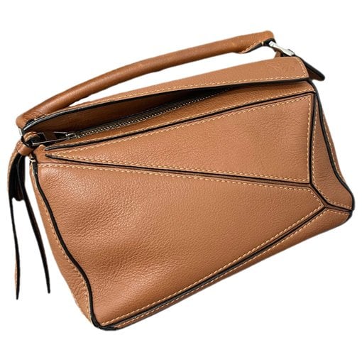 Puzzle leather handbag