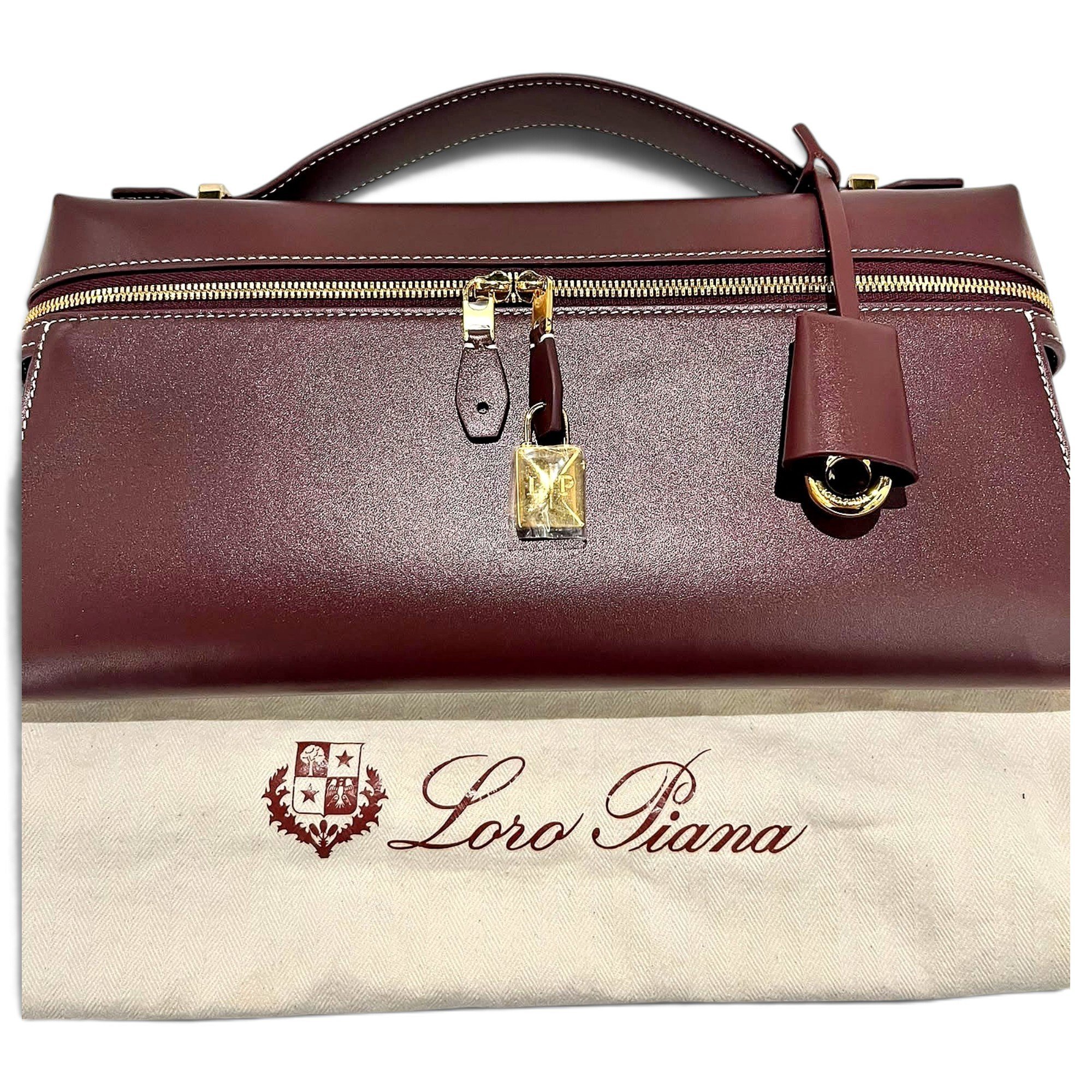 Loro Piana Extra Clutch leather handbag