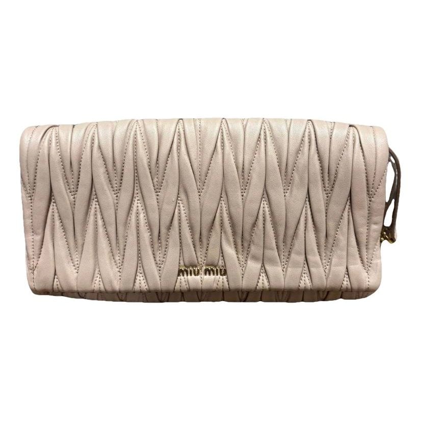 Matelassé leather clutch bag