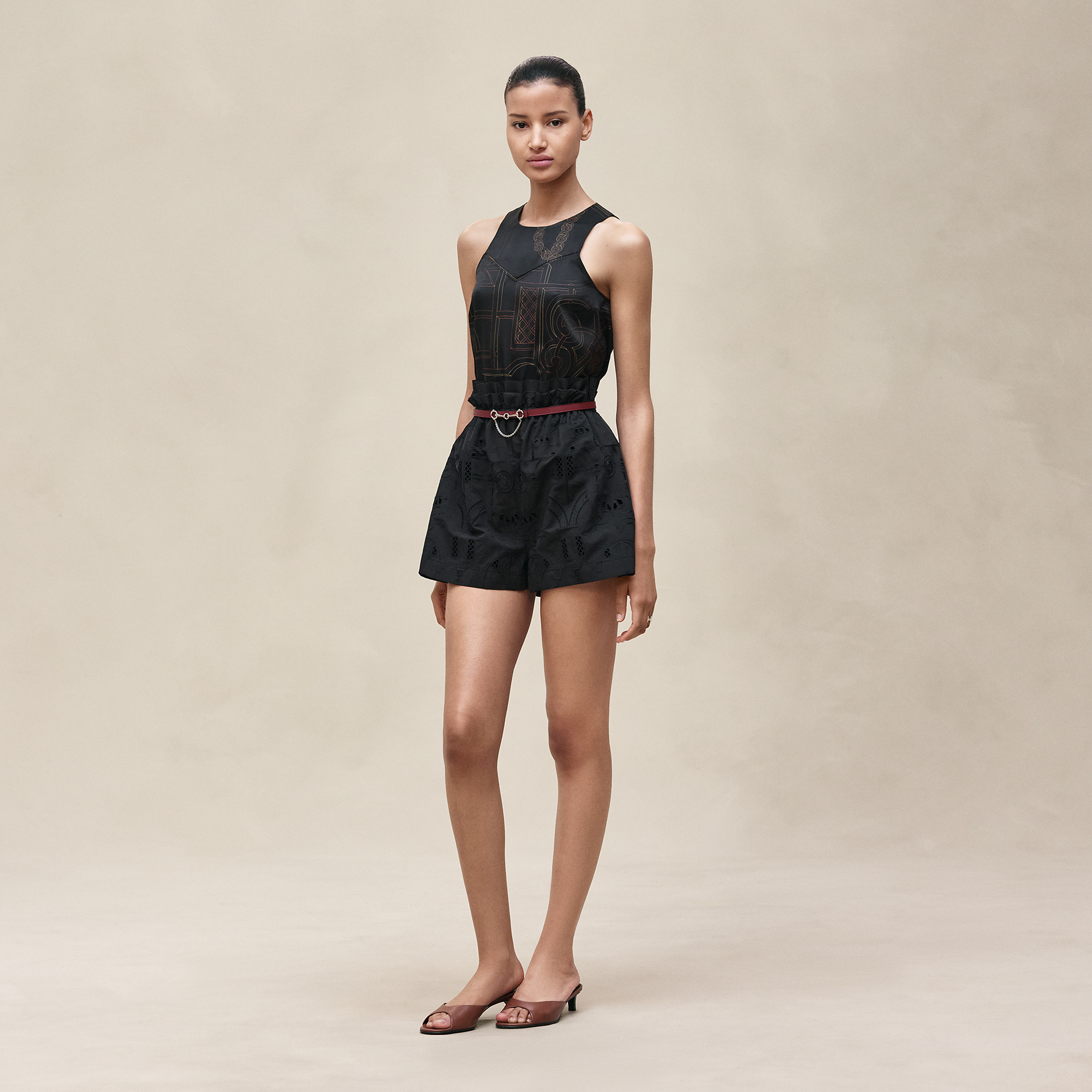 Shorts with embroidered pouch