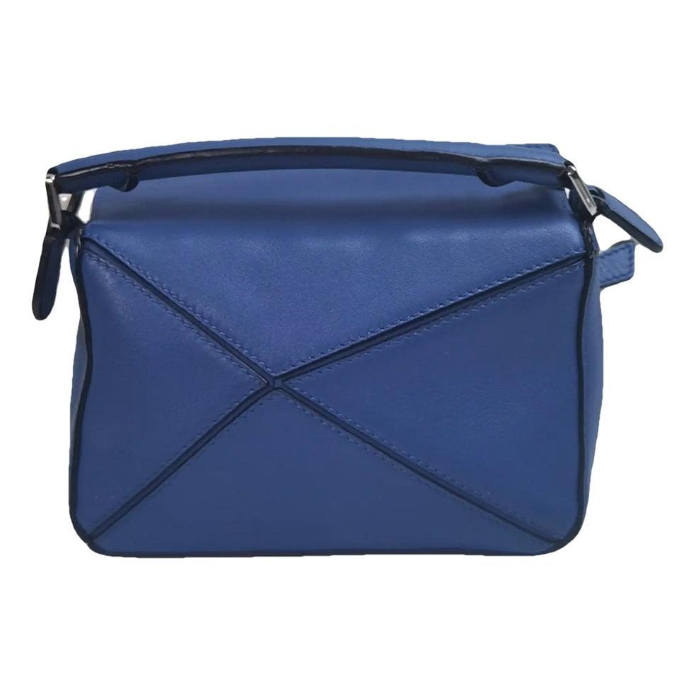 Puzzle leather handbag