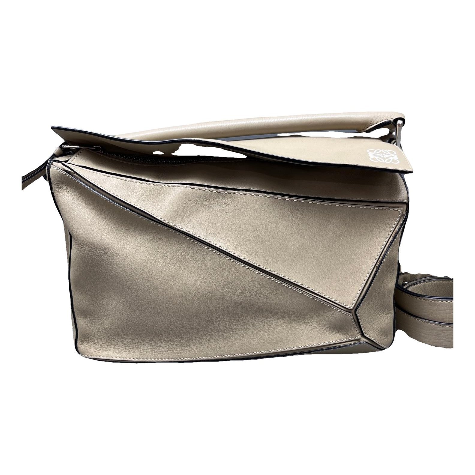 Puzzle leather handbag