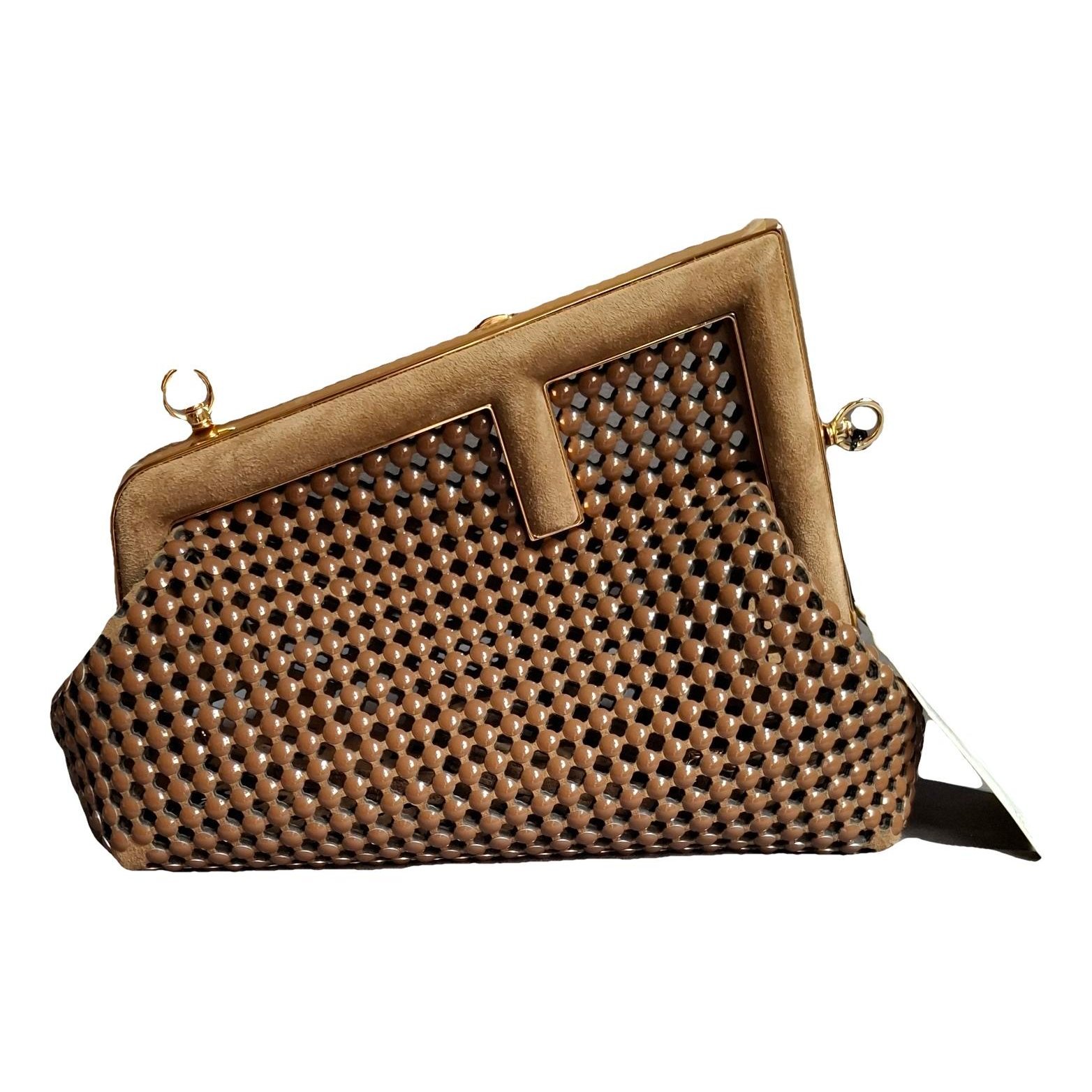 First handbag