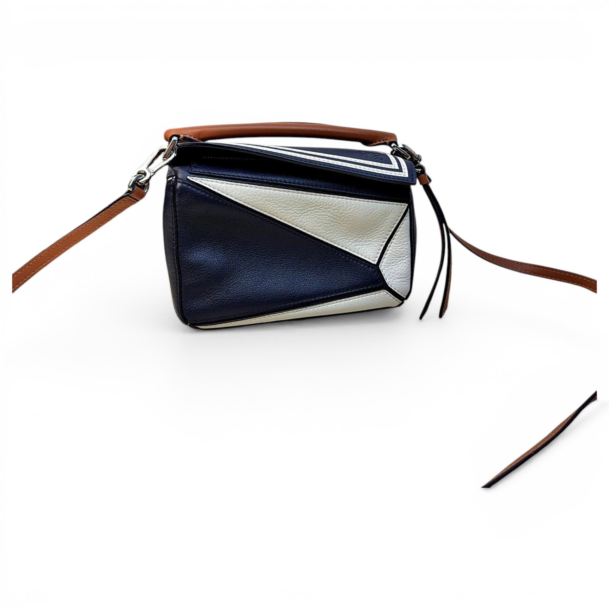 Puzzle leather handbag