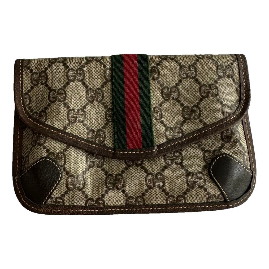 Ophidia leather clutch bag