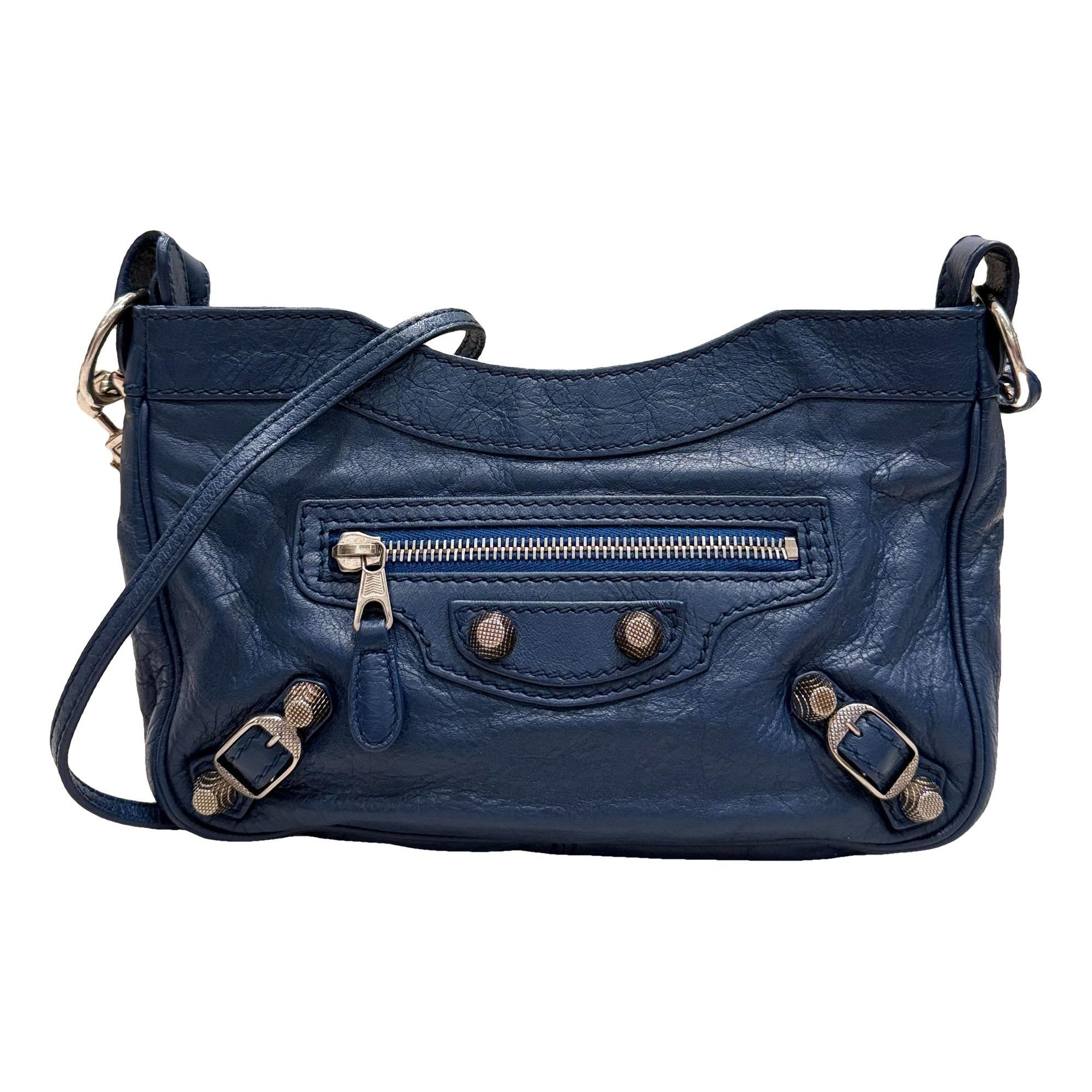 First leather handbag