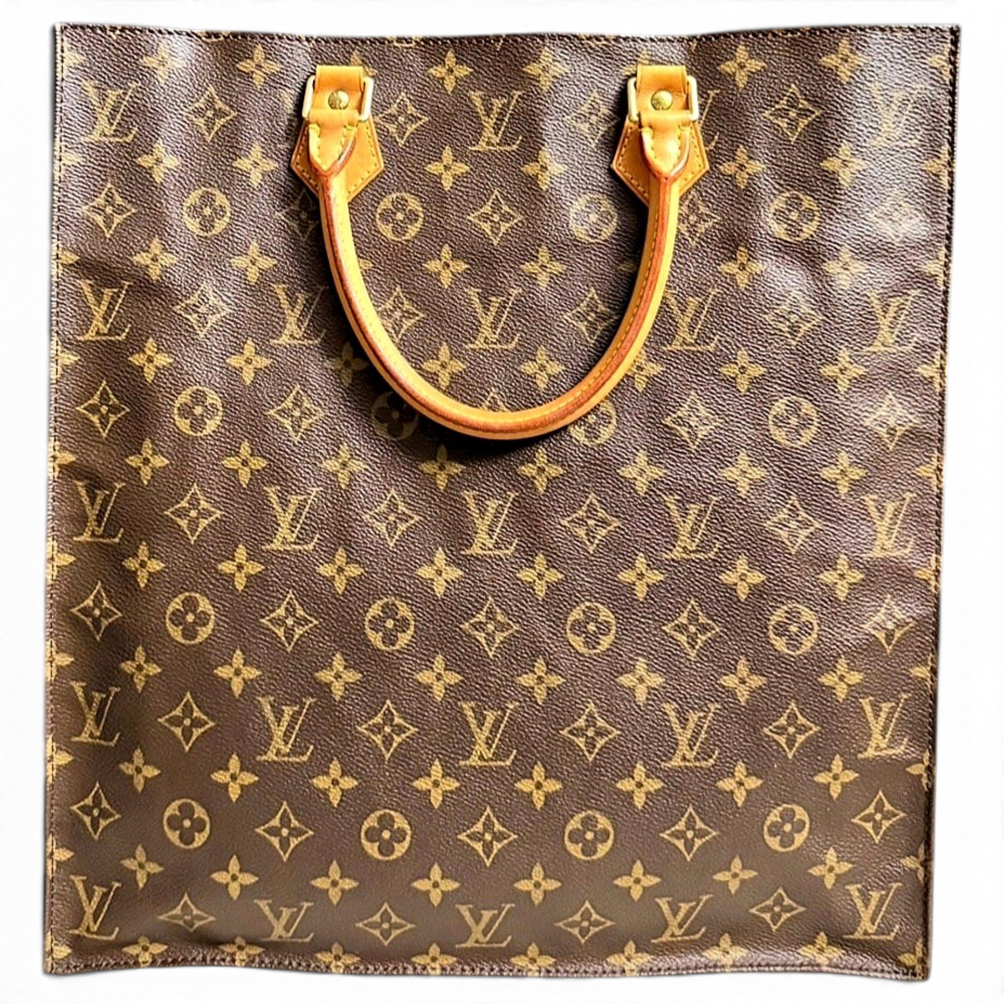 Plat patent leather handbag