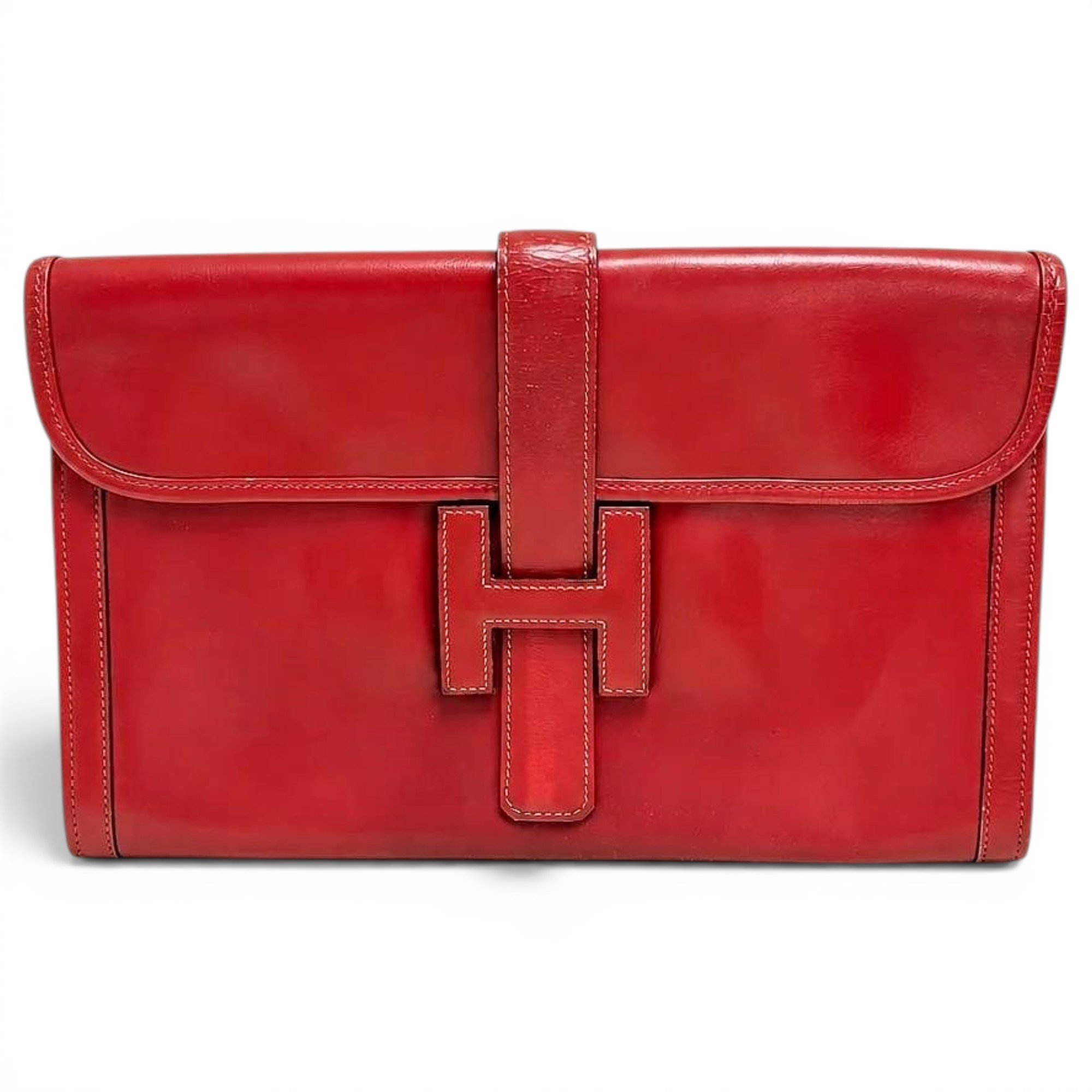 Jige leather clutch bag