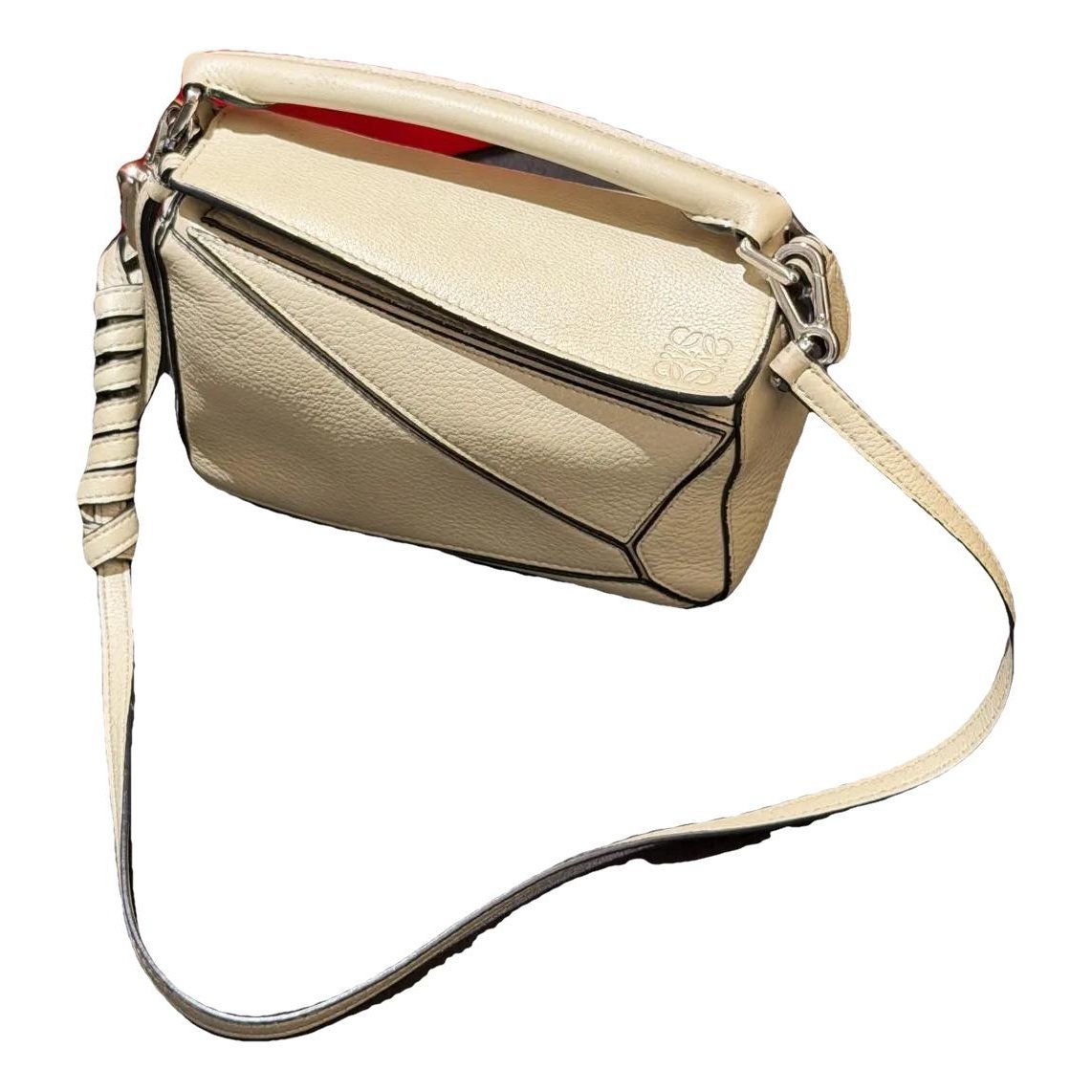 Puzzle leather handbag