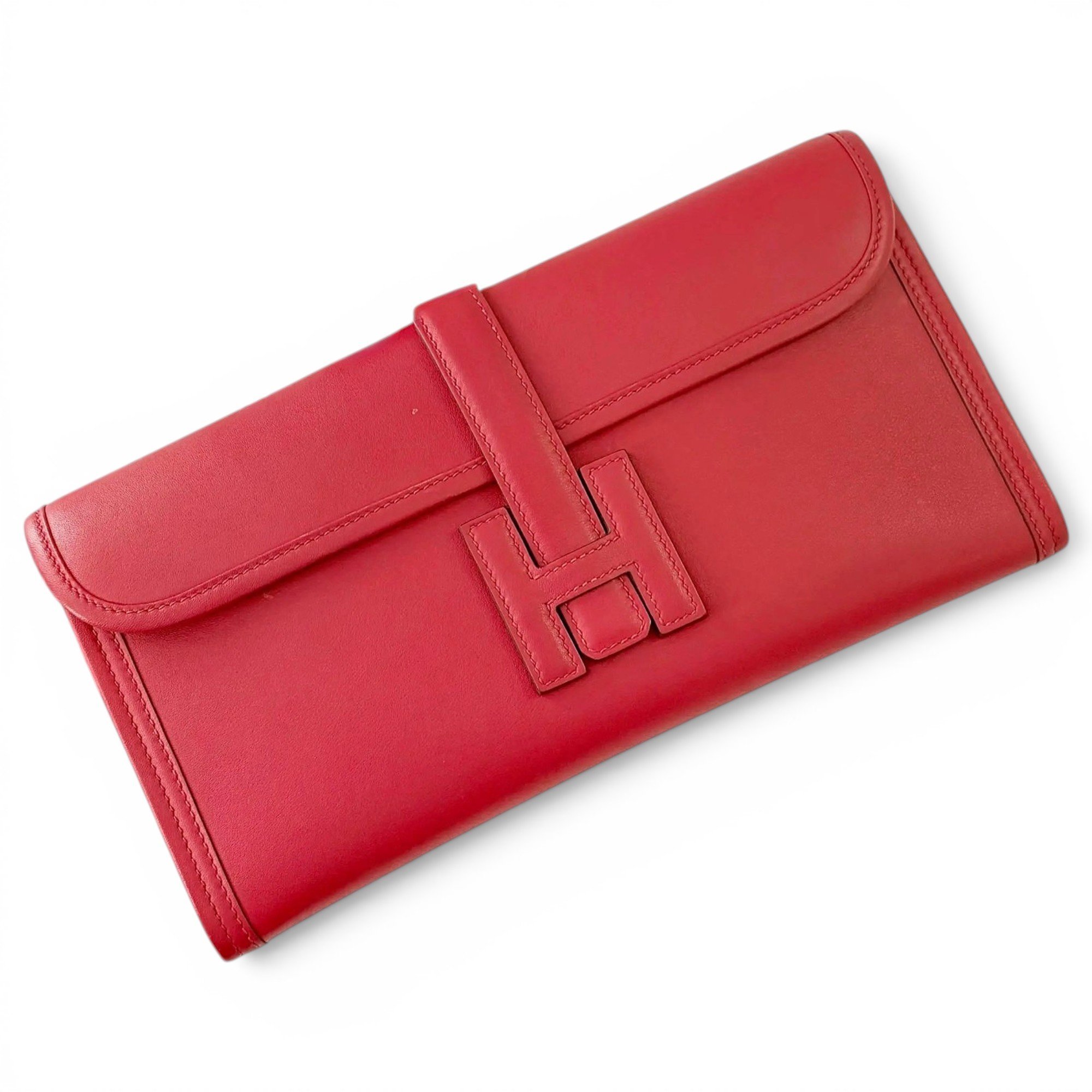 Jige leather clutch bag