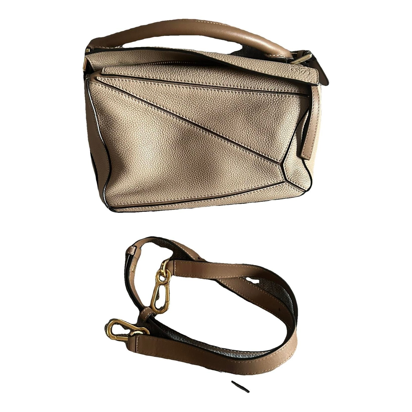 Puzzle leather handbag