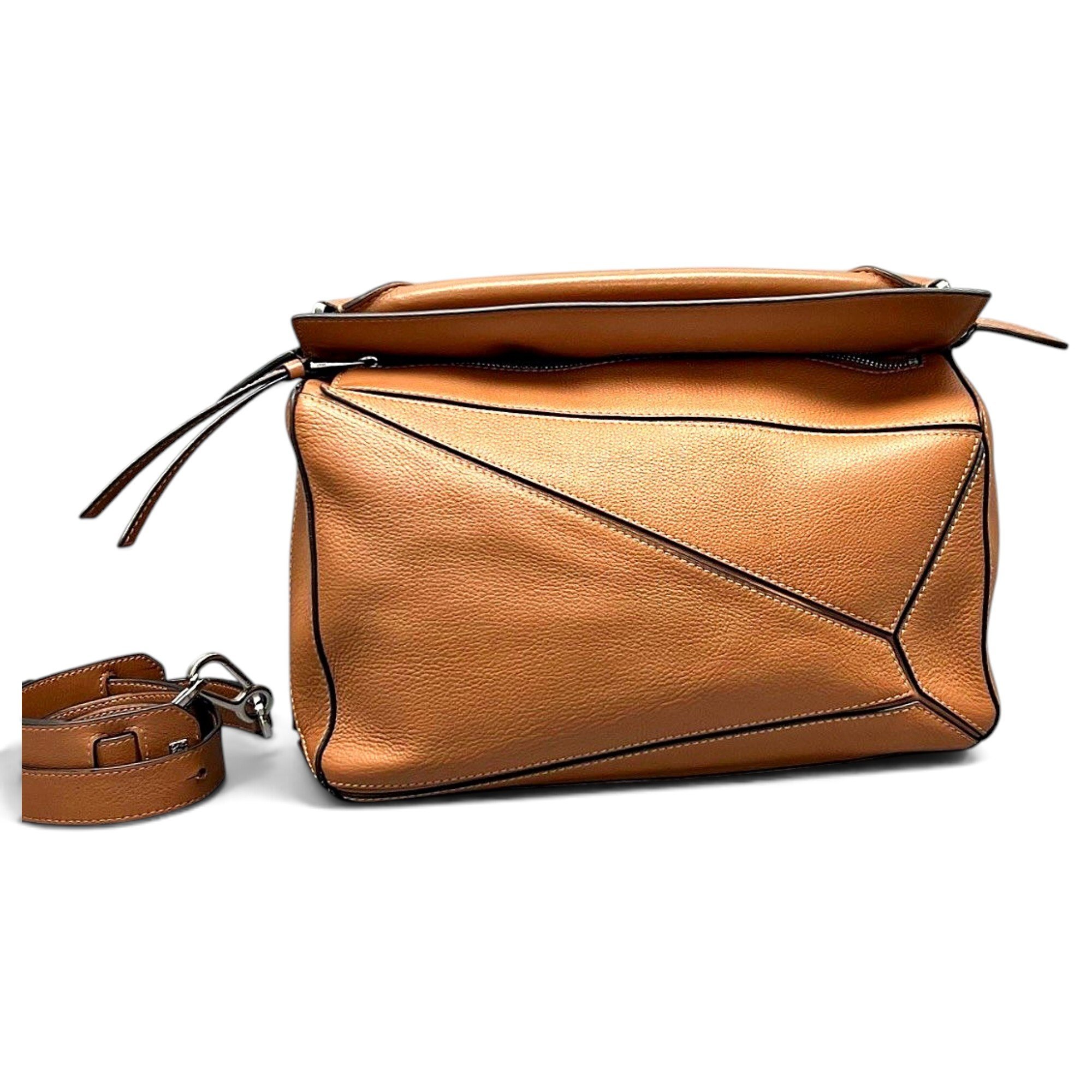 Puzzle leather handbag