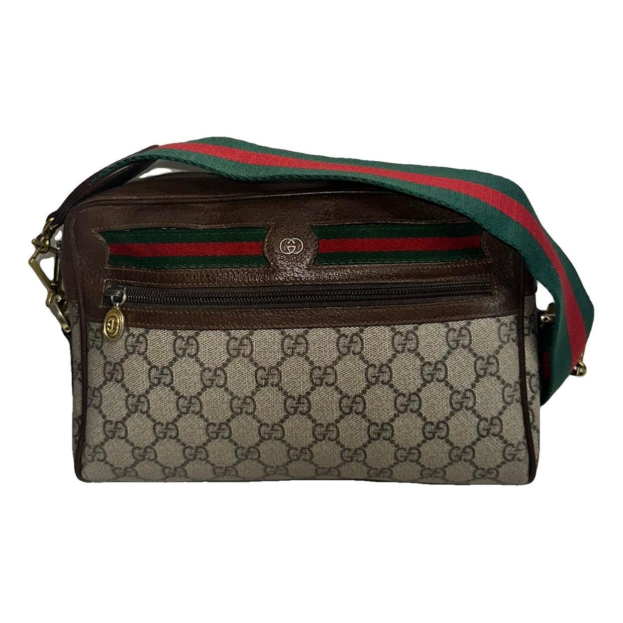 Ophidia vinyl crossbody bag