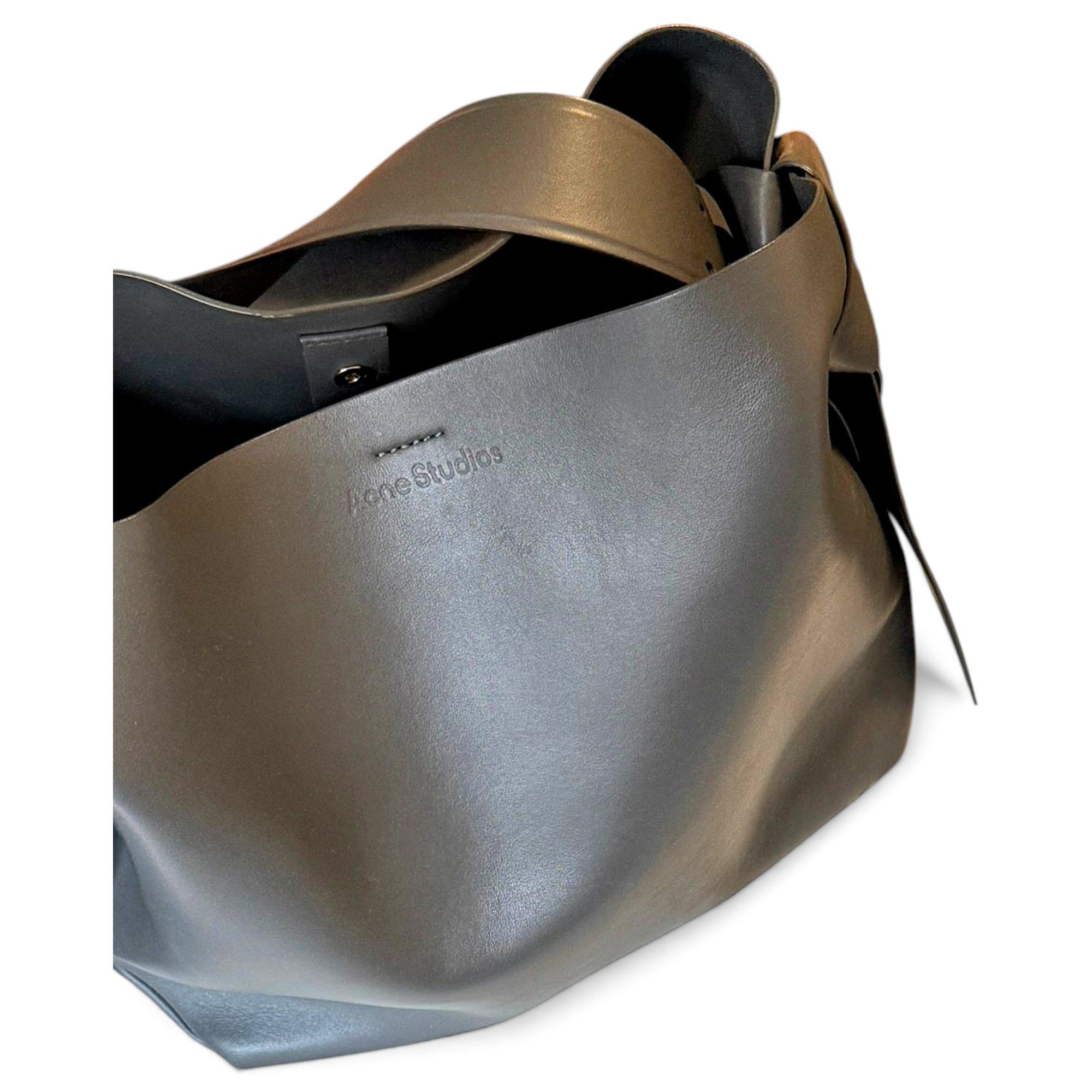 Musubi patent leather handbag