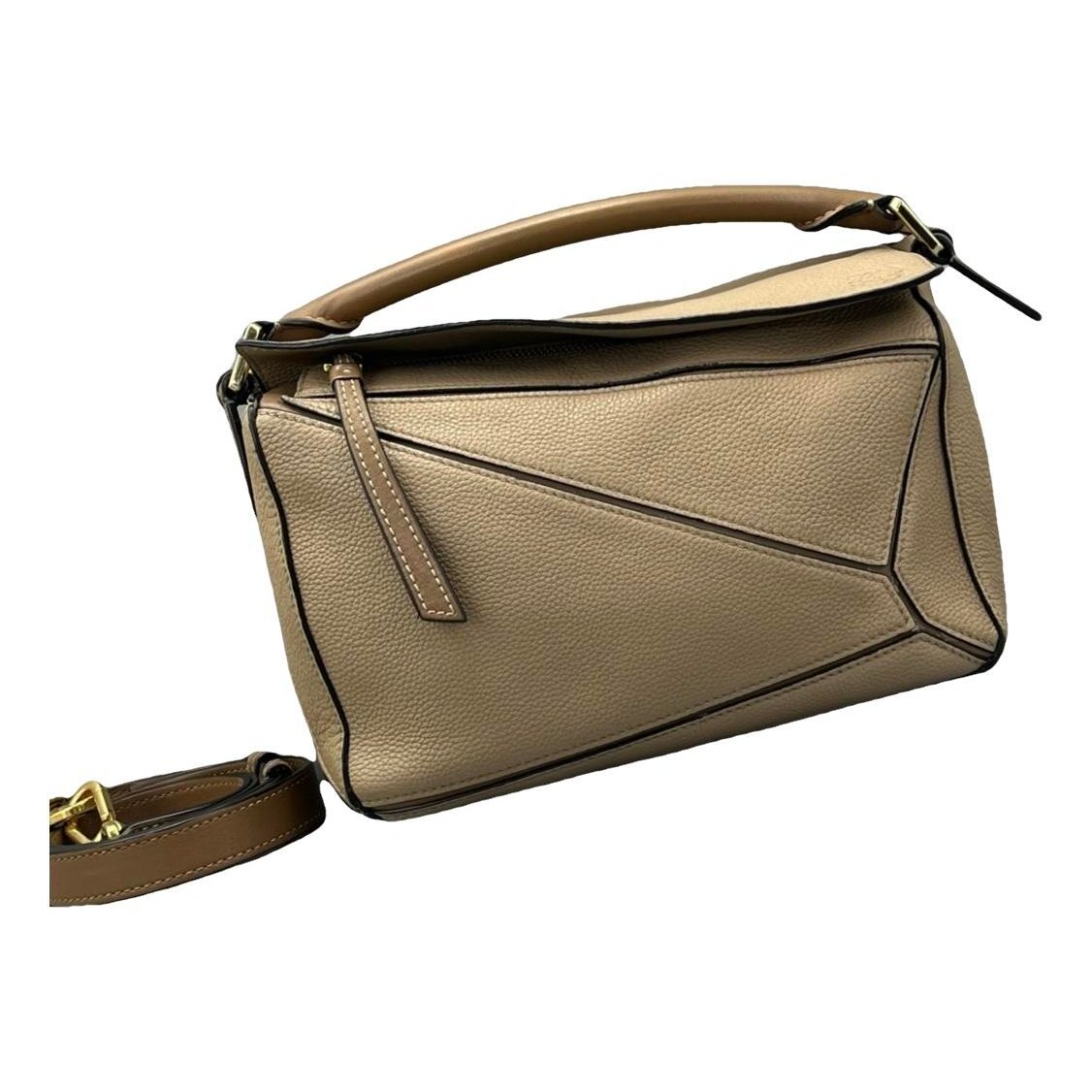 Puzzle leather handbag