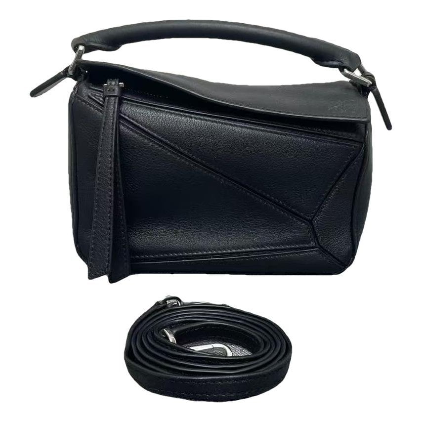 Puzzle leather handbag