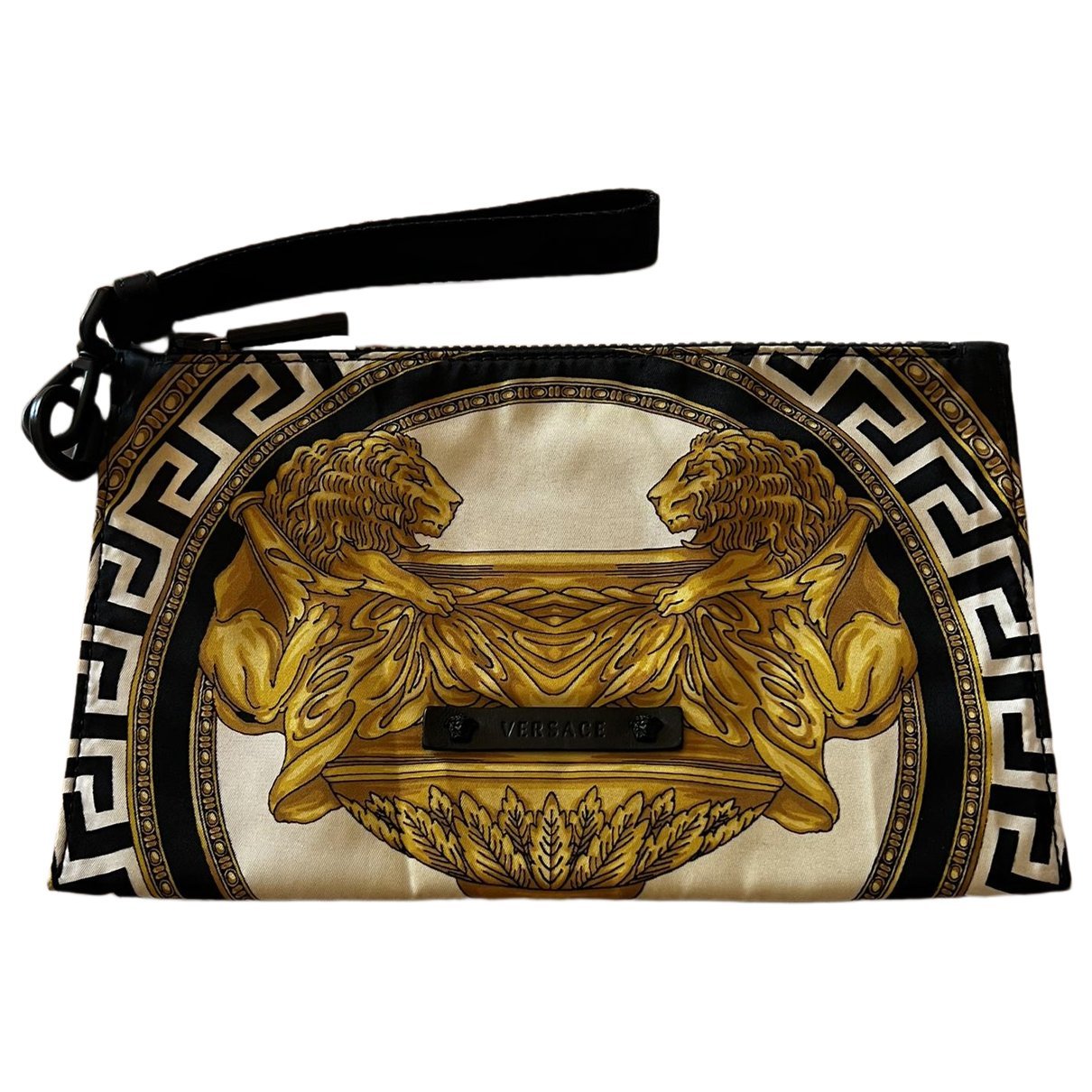 La Medusa cloth clutch bag