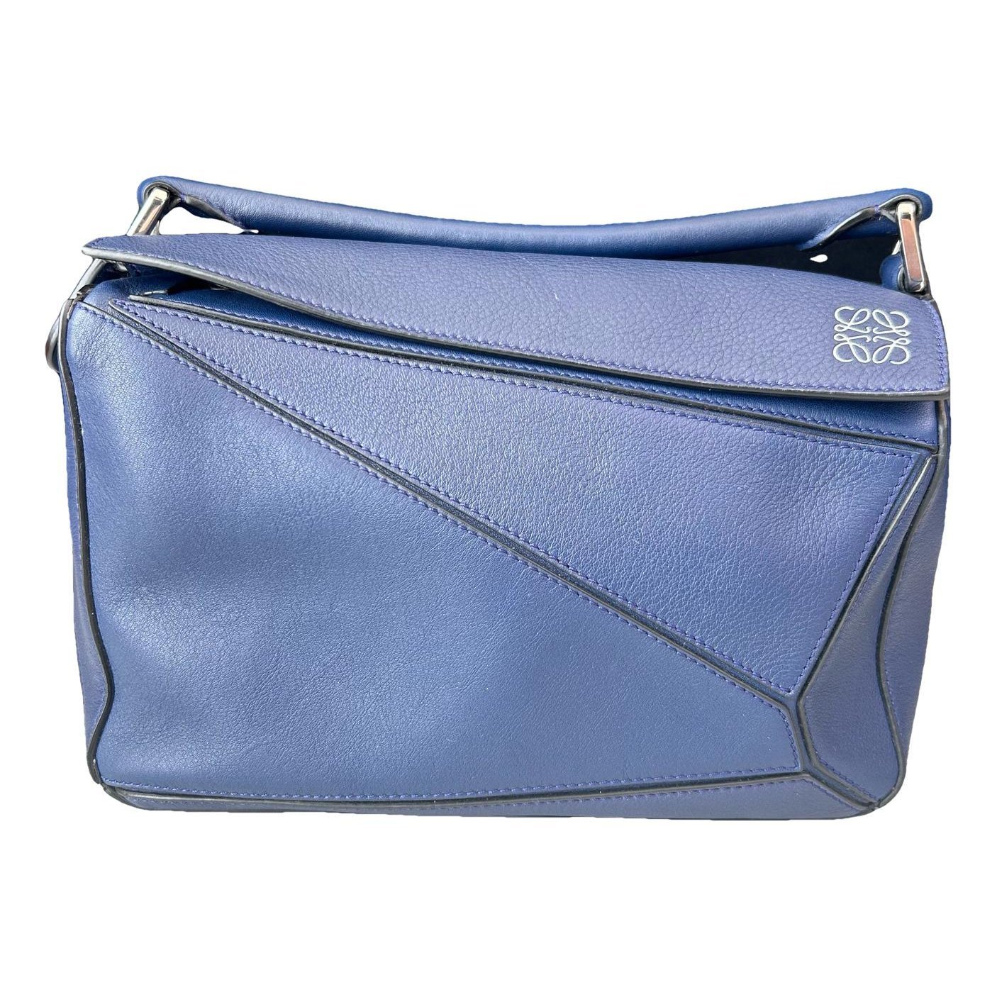 Puzzle leather handbag