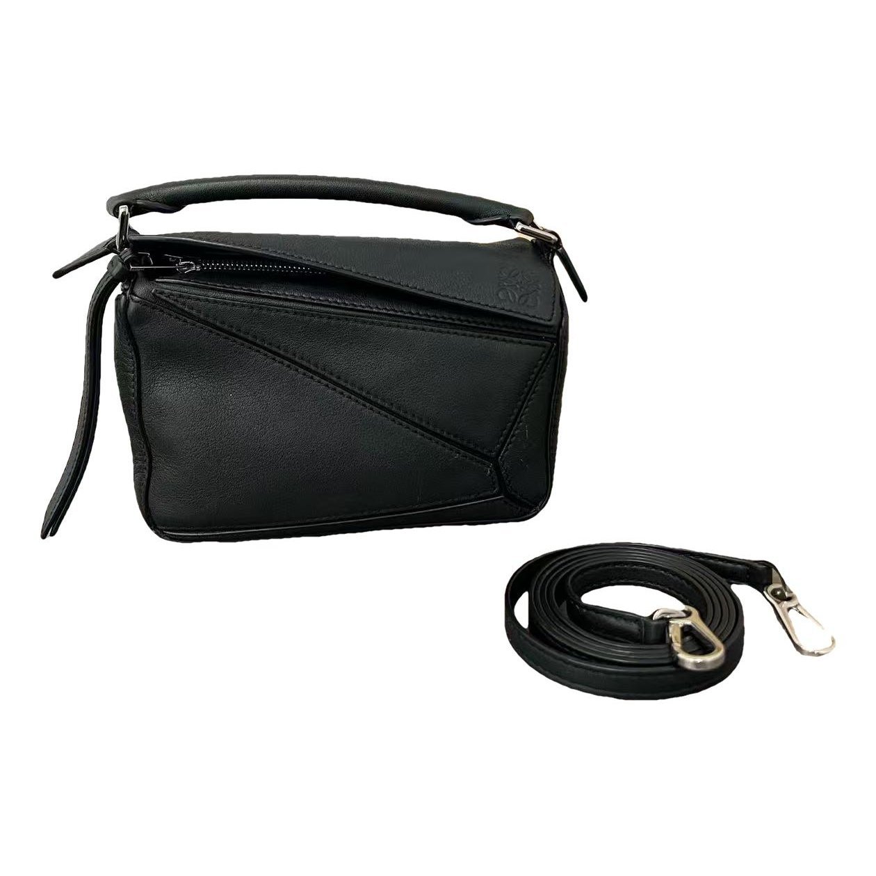 Puzzle leather handbag