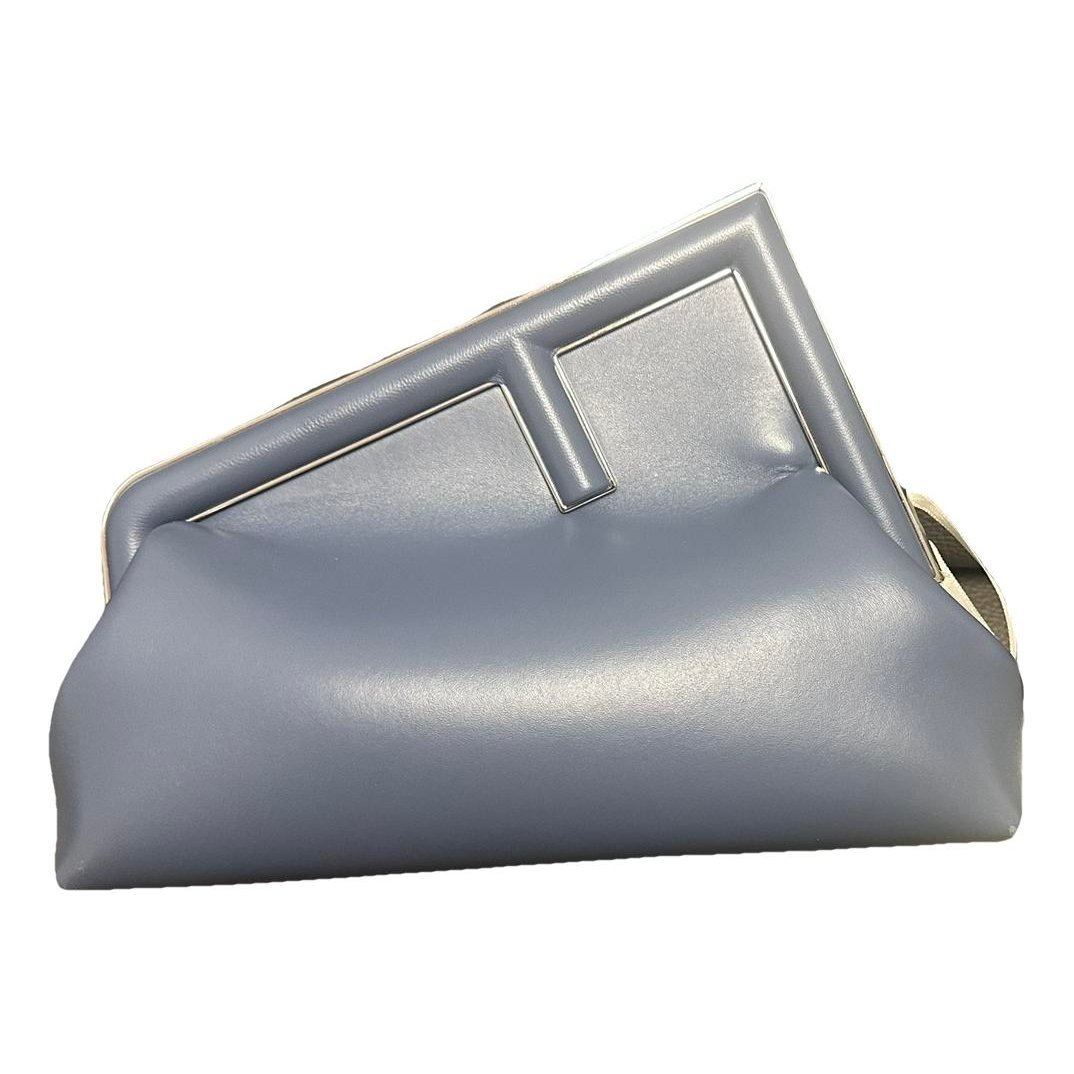 First leather handbag