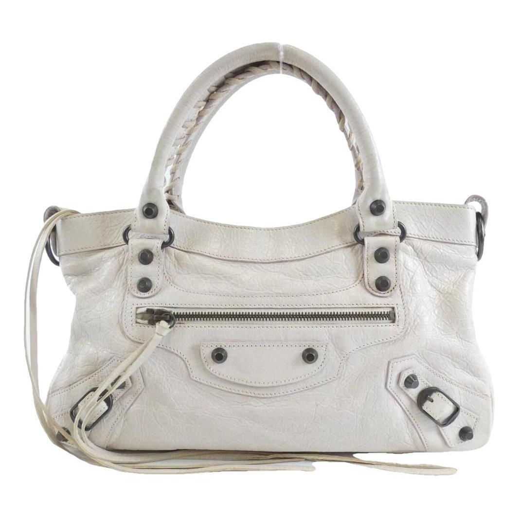 First leather handbag