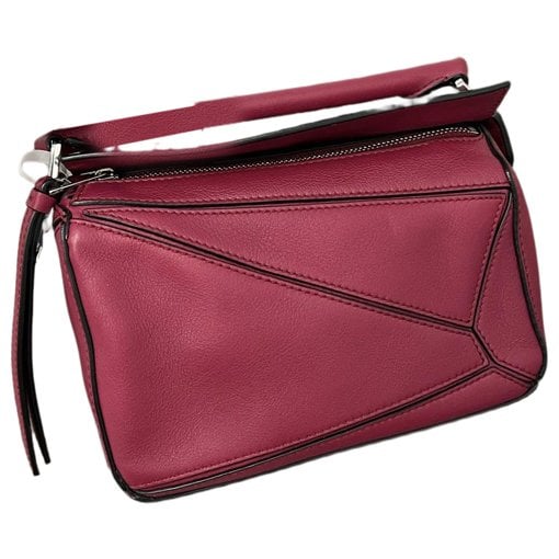 Puzzle leather handbag