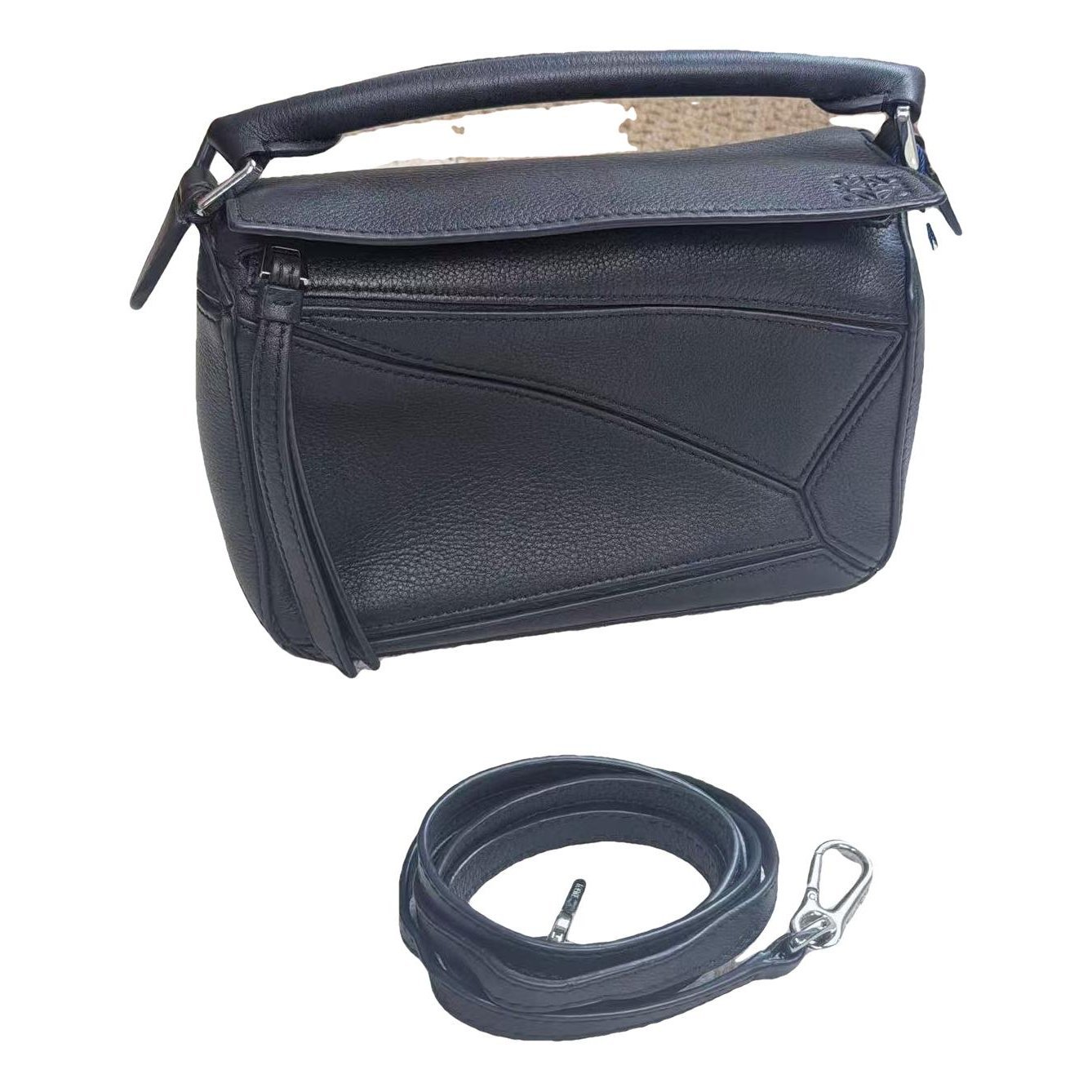 Puzzle leather handbag