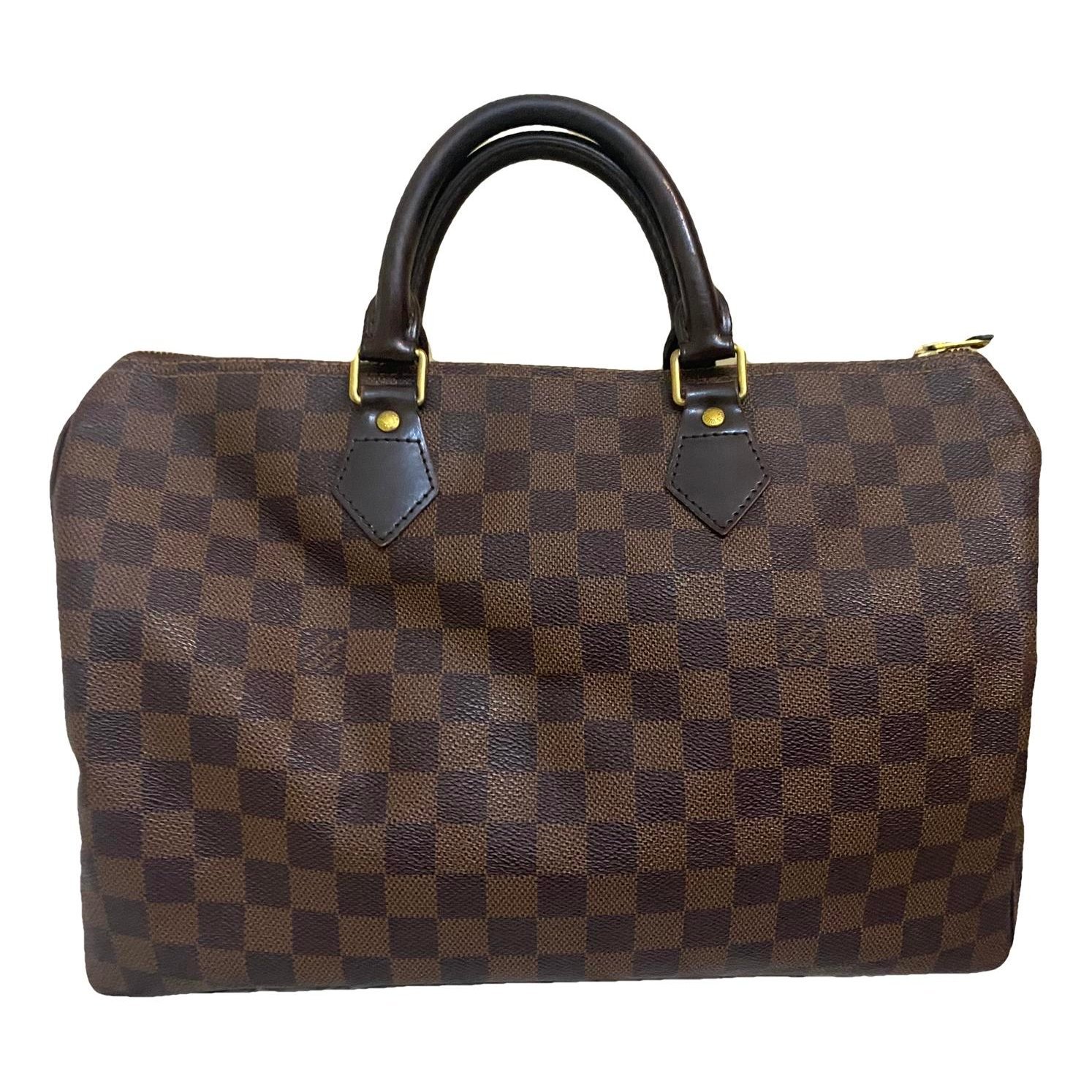 Louis Vuitton Speedy cloth handbag