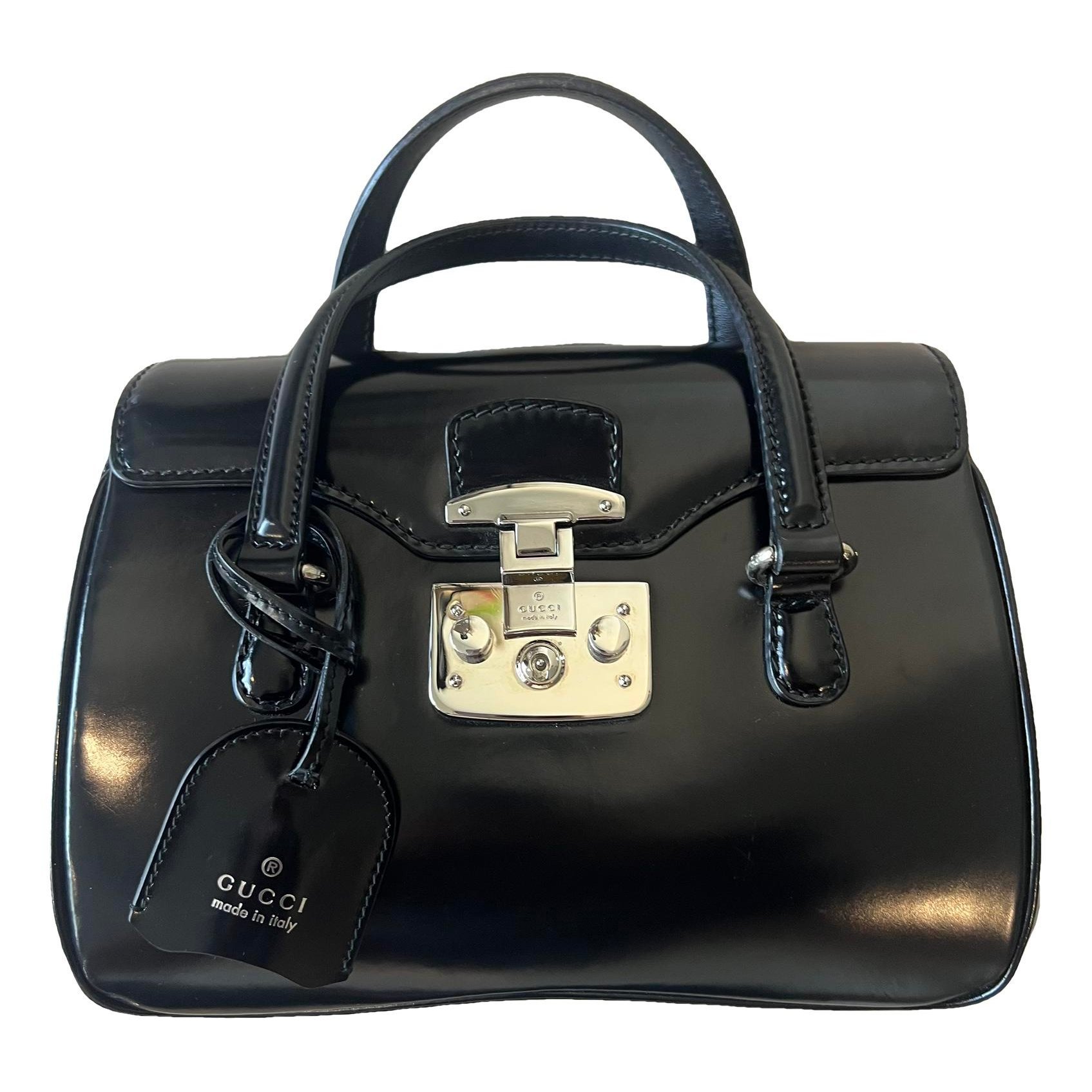 Lady Lock patent leather handbag