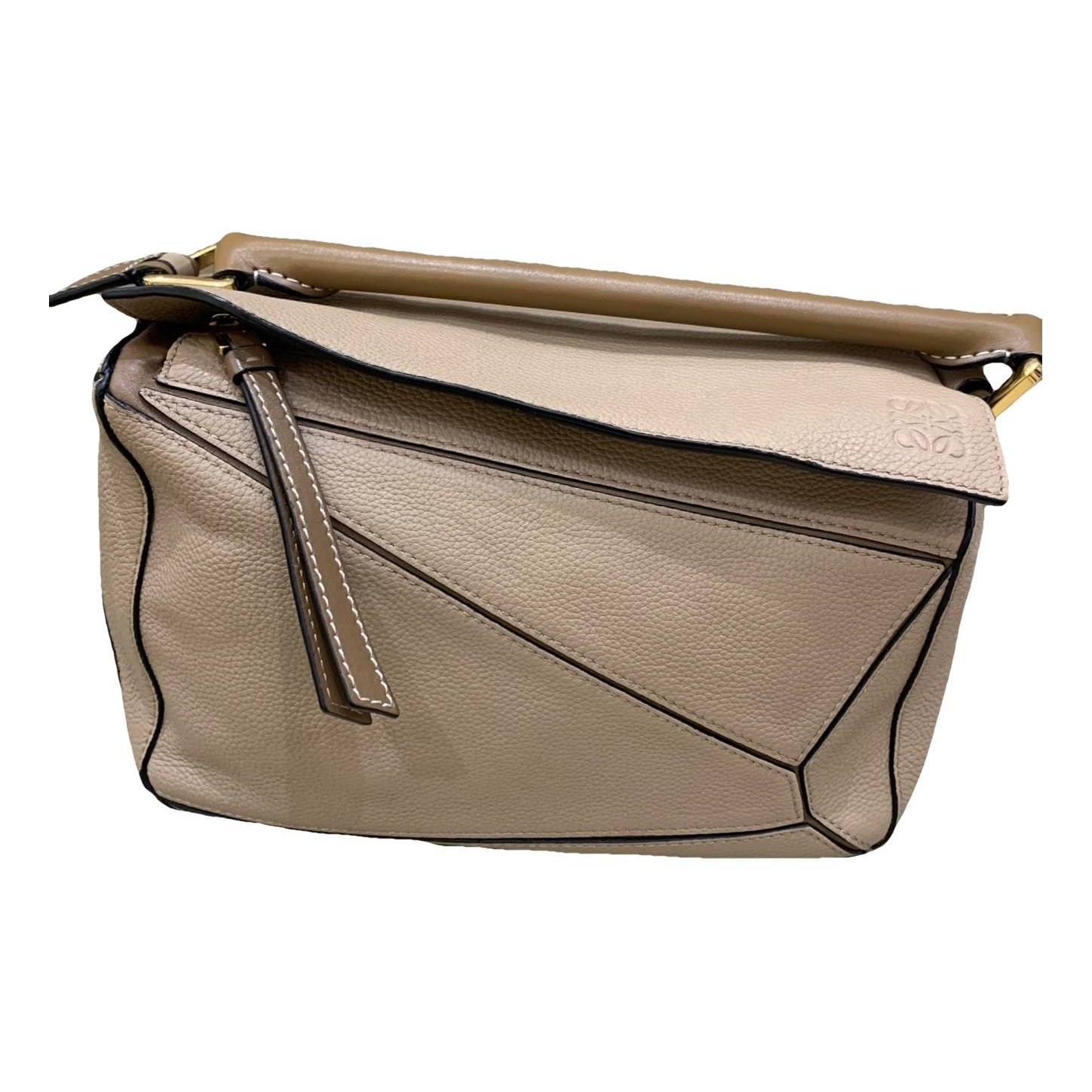 Puzzle leather handbag