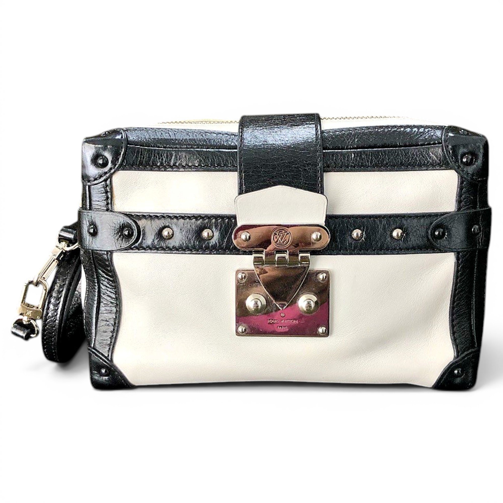 Pochette Trunk leather handbag