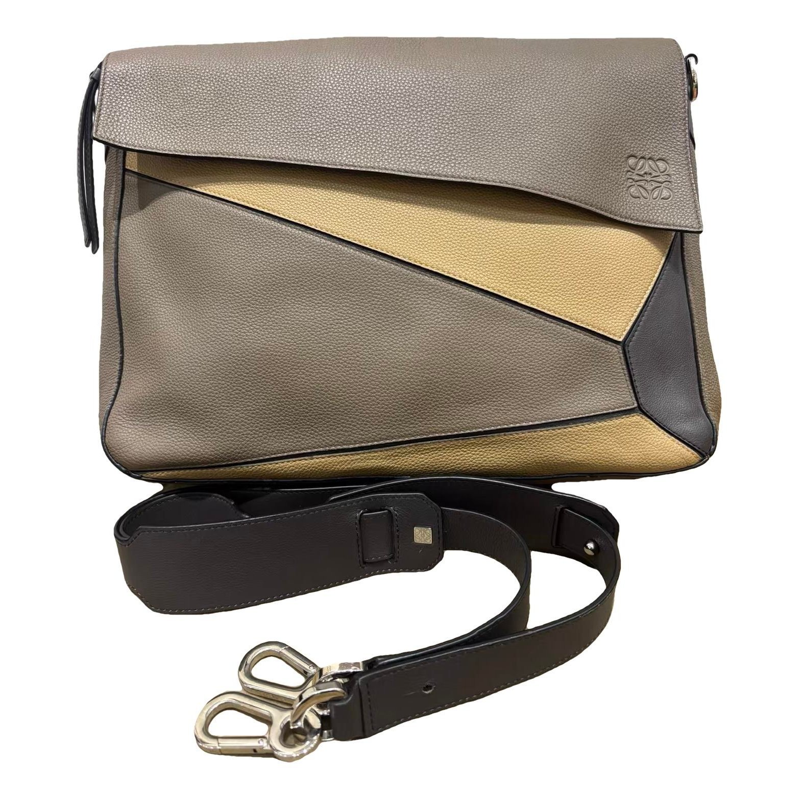 Puzzle leather handbag