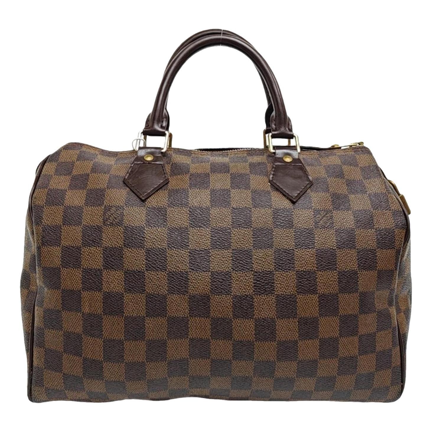 Nano Speedy / Mini HL leather handbag