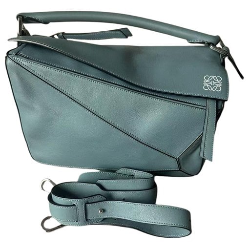 Puzzle leather handbag