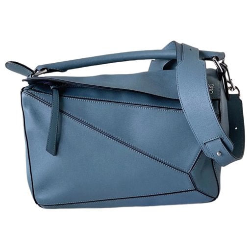 Puzzle leather handbag