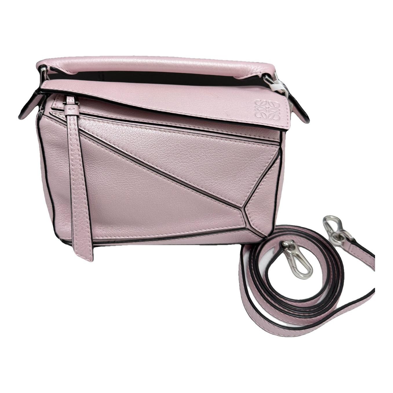 Puzzle leather handbag