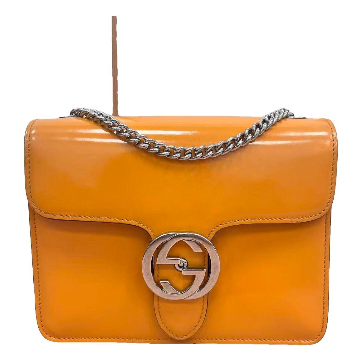Interlocking patent leather handbag