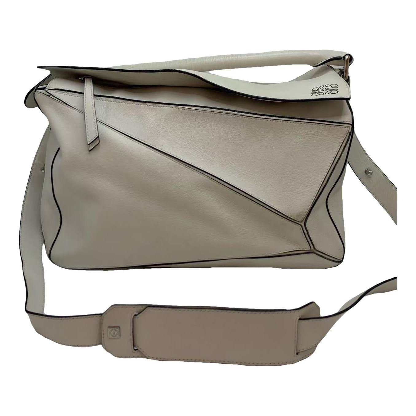 Puzzle leather handbag