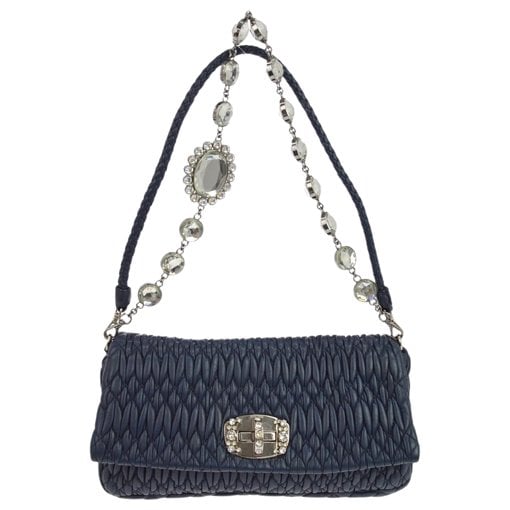 Miu Crystal leather clutch bag