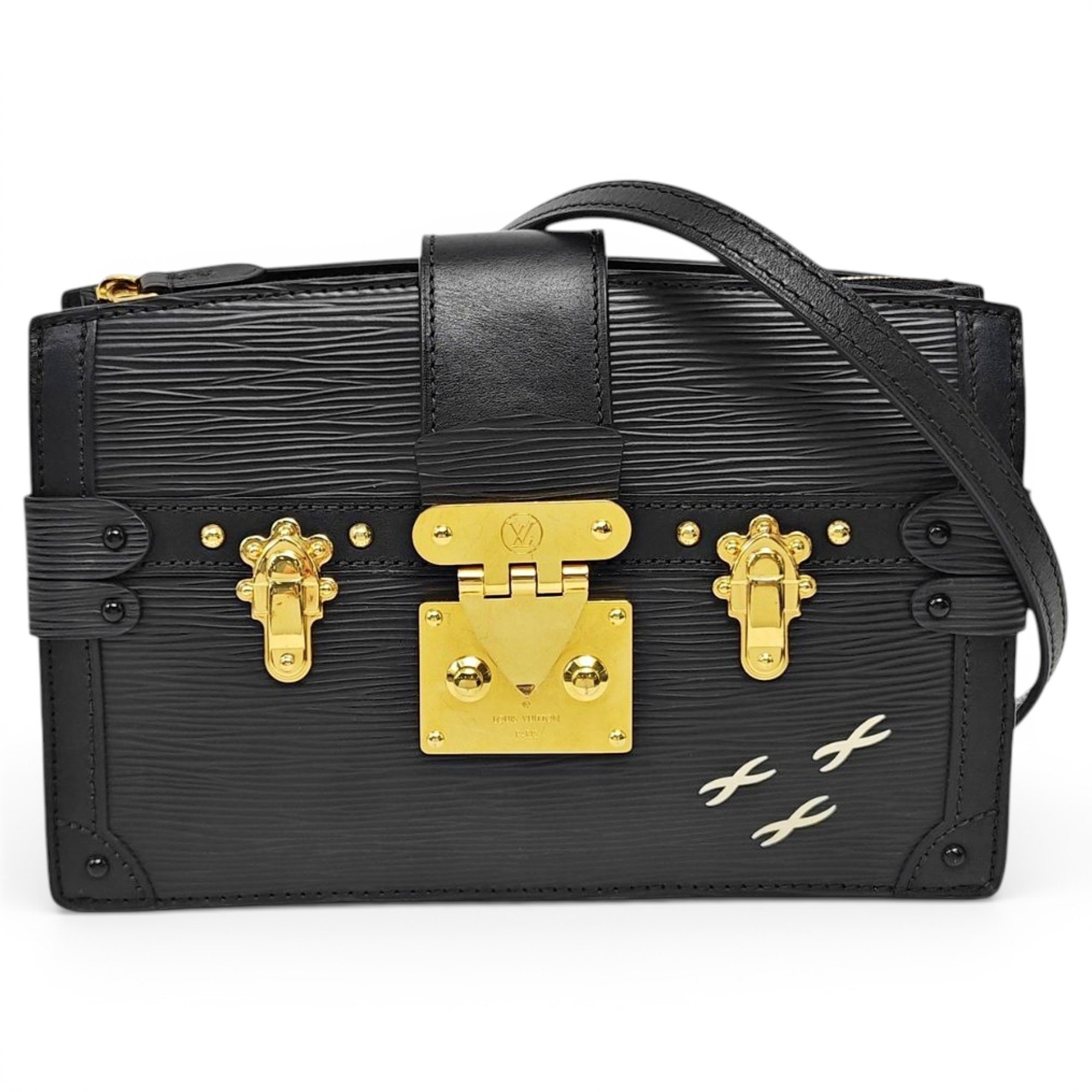 Pochette Trunk leather handbag