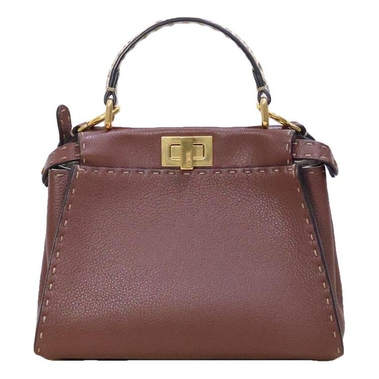Peekaboo mini pocket leather handbag