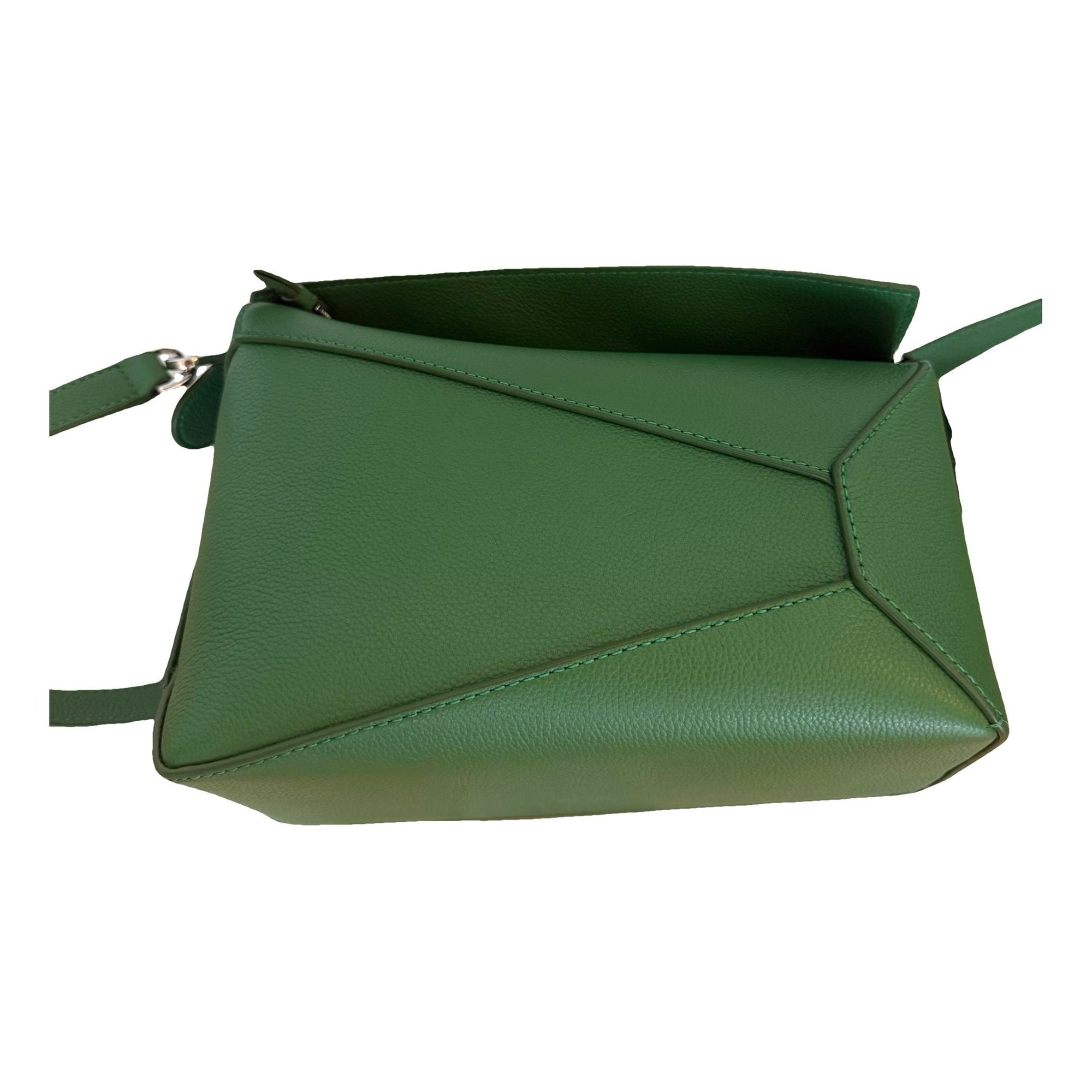 Puzzle leather handbag