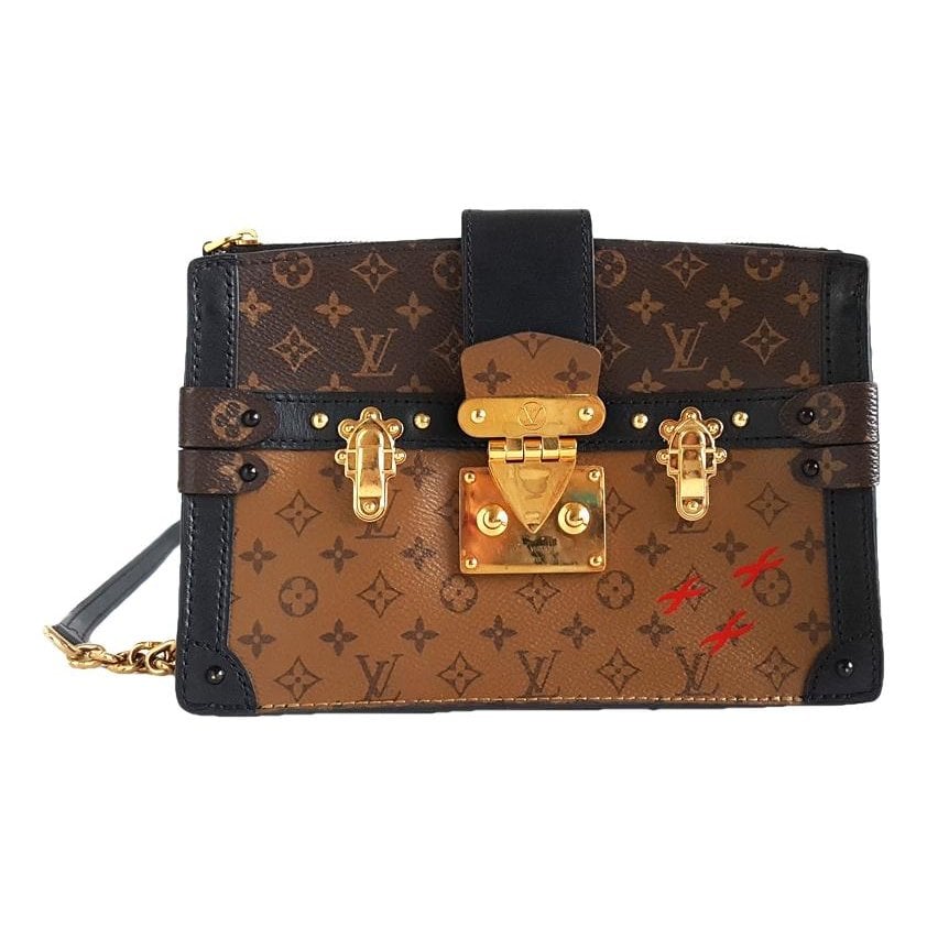 Pochette Trunk leather handbag