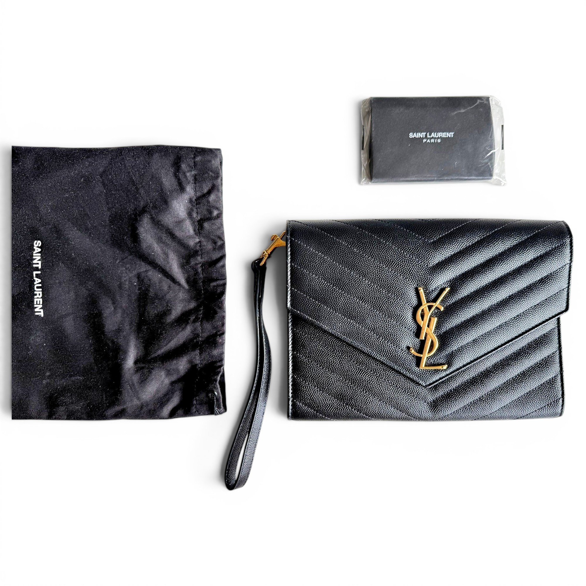 Cassandre leather clutch bag