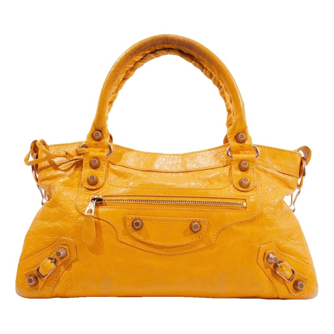 First leather handbag