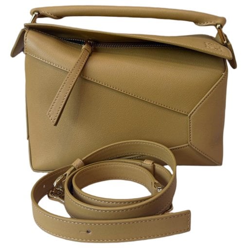 Puzzle leather handbag