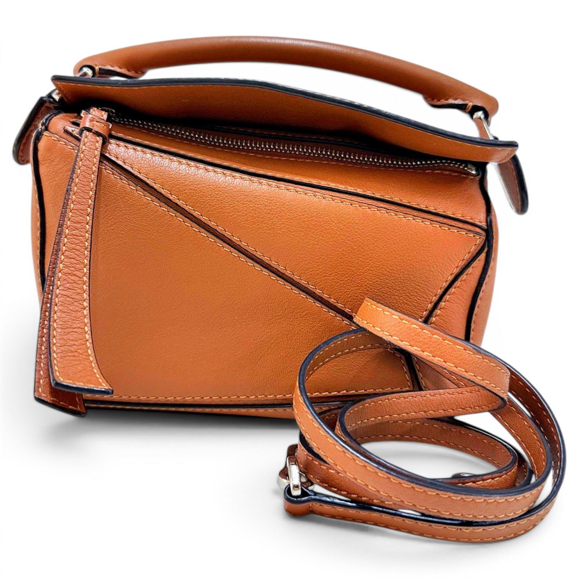 Puzzle leather handbag