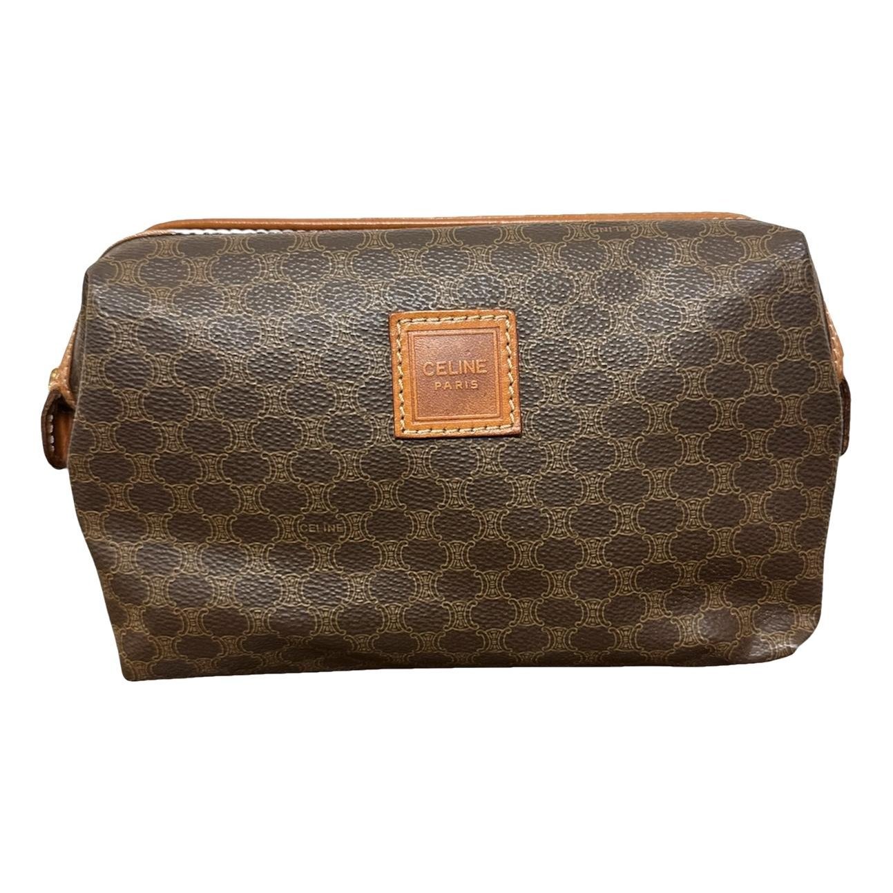 Triomphe Vintage leather clutch bag