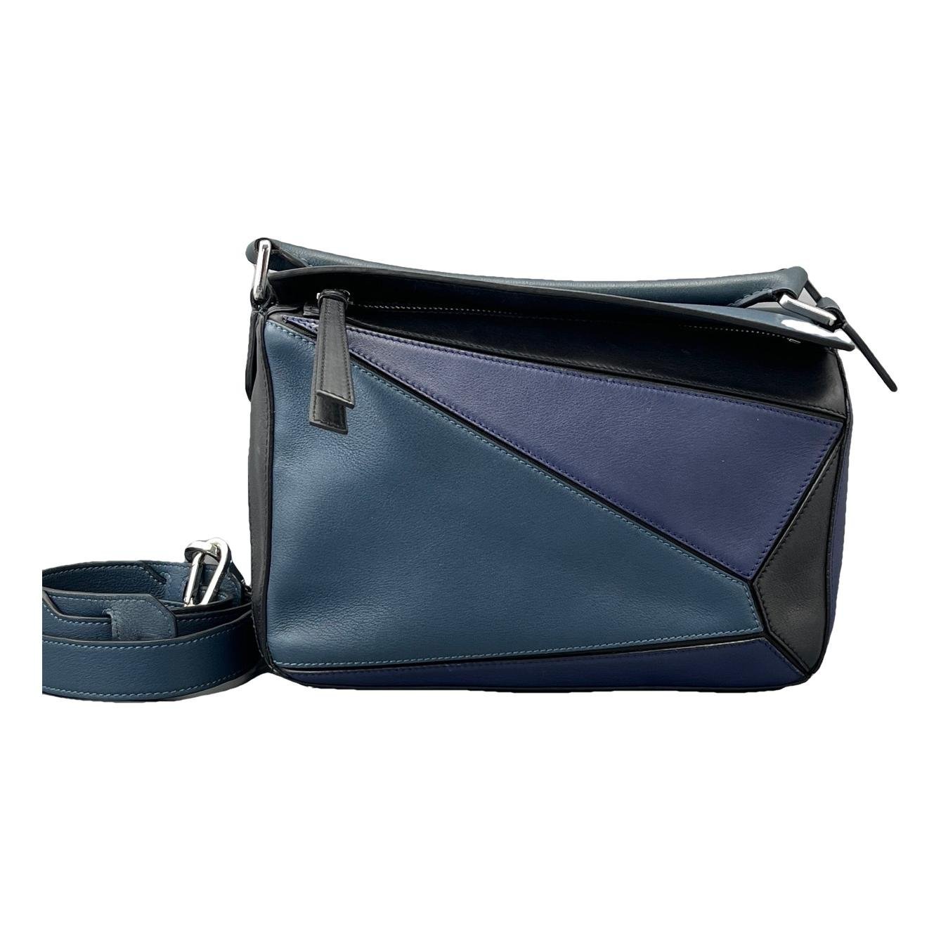Puzzle leather handbag